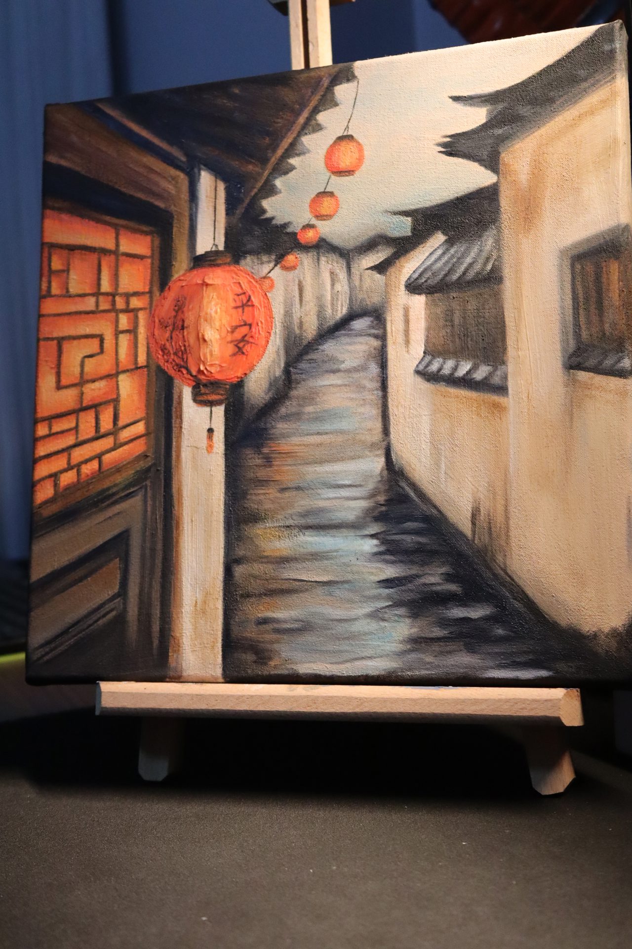 Red Lantern Alley Landscape Oil Painting — A Chinese water-town alley at dusk, lit by a textured red lantern bearing 平安 (peace)